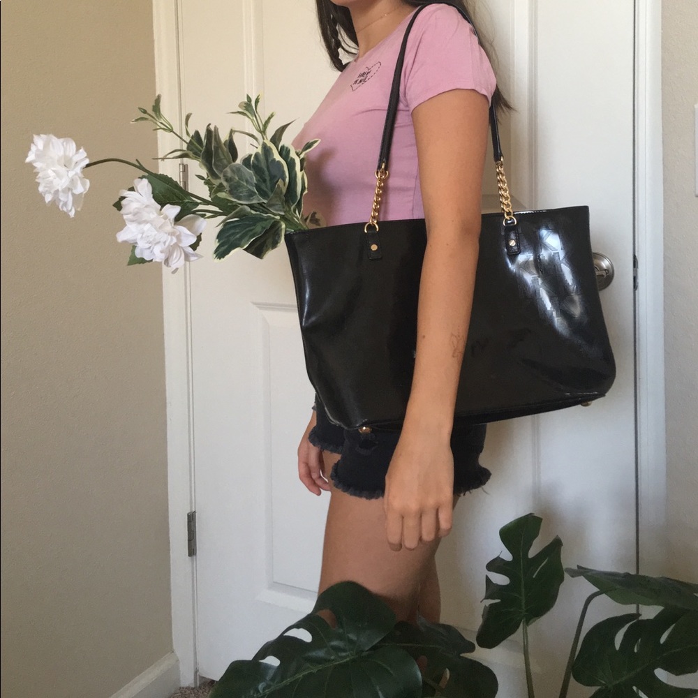 Black Michael Kors tote/purse with gold chain